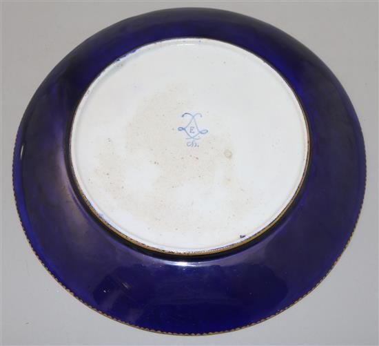 A Sevres style plate, possibly an 18th century blank later decorated 24.5cm